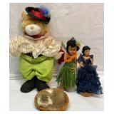 Swashbuckling cat, napping cat, two dolls