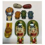 Group of old clickers, two little metal cars