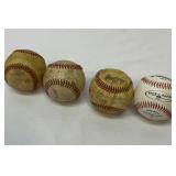 Four baseballs. Rawlings, etc