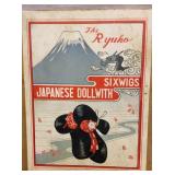 Japanese doll with six wigs in original wood box.