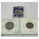 Couple of coins and moon landing stamp