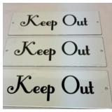 Three porcelain and metal KEEP OUT signs
