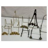 Nine adjustable or fixed plate stands