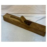 Old wood block plane. 21 inches long