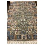 Small ornate area rug for doorway