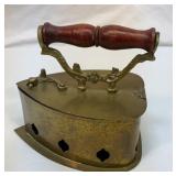 Old brass charcoal iron