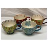 Four Dutch Wax handpainted ceramic mugs