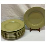 Nine heavy stoneware 11 inch plates