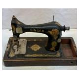 Antique Singer sewing machine with wood box