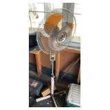 Oscillating stand fan. Spins when I turned it on.