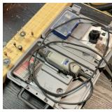 Dremel, case and extra tips. Works.