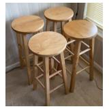 Four 29 inch wood stools