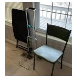 Table, chair, and luggage roller