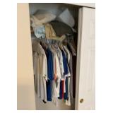 Closet with shirts and sheets