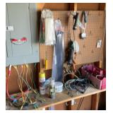 Contents on wall. Zip ties, bungee cords,