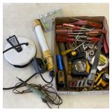 Flat of tools. Tape measures, job light, etc