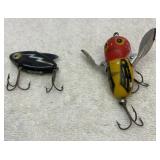Two Heddon lures.  Crazy Crawler and Sonic