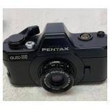 Pentax Auto 110 camera with winder and flash