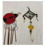 Two stained glass window pieces.