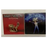 Two Barry Manilow albums.