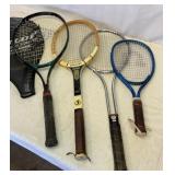 Three tennis rackets and racquetball racket