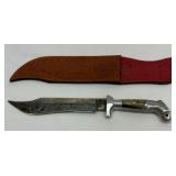 Engraved fixed blade knife with eagle head