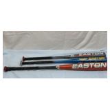 Three Easton aluminum baseball bats