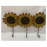 Metal sunflower wall decor with hooks