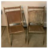 Two antique wood folding chairs