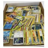 Large group of Pokeman cards and some sleeves