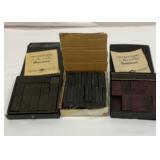 Three vintage double six dominoes sets.  Complete.