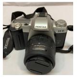 Pentax ZX-10  35 mm camera with bag and acc.
