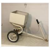 Sears Cyclone seeder.  Pull behind broadcast