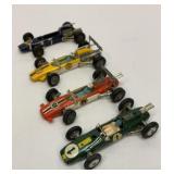 Four Corgi open wheel racing cars. Great Britain