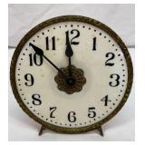 Antique glass and brass clock