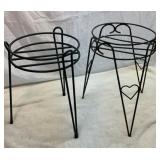 Two metal plant stands. Both 12 inches tall.
