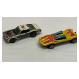 Two Hot Wheels redline cars. See description.