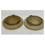 Two onyx ashtrays