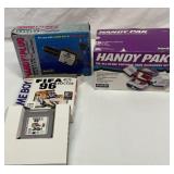 Game Boy power cord, accessory pack and game
