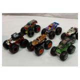 Six Hot Wheels monster trucks