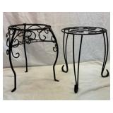 Two decorative metal plant stands