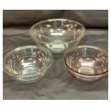 Pyrex mixing bowls. Two 8 inch and a 12 inch.
