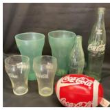 Coca-Cola items. Bottles, 5 inch glasses, etc..