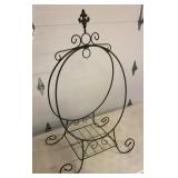 Collapsible metal plant hanger. 39 inches tall.