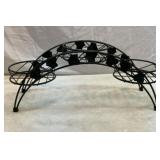 Metal arch plant stand.  20 inches wide.