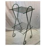 Metal two-tier plant stand.  27 inches tall.