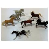 Seven miniature Breyer horse figures