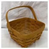 Longaberger basket with insert.  9 inches wide.