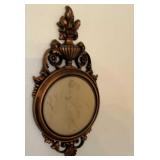 Two figural plastic wall hangers