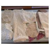 Lace tablecloths, doilies, other finery, etc.